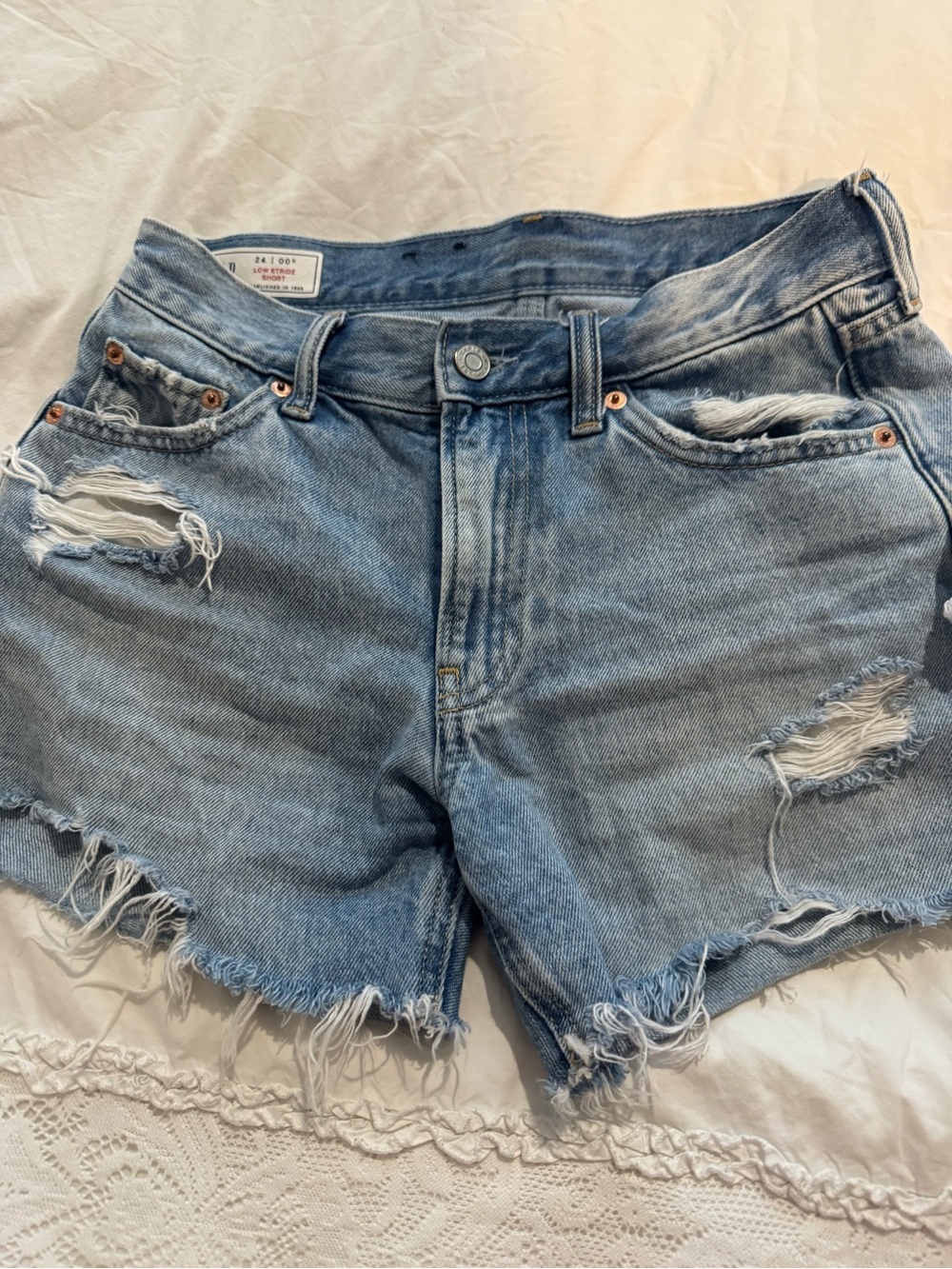 GAP Light Blue Distressed Denim Cutoff Shorts and white denim .
